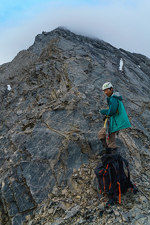 With low clouds hiding the upper ridge, the feeling is a bit intimidating when we first hit the west ridge.