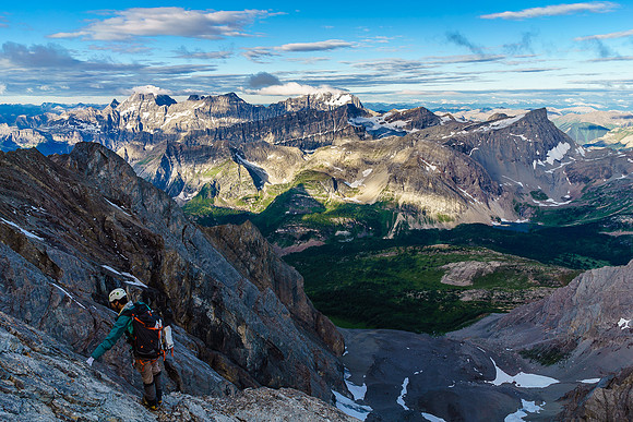 Steven checks for a good line while I check out the Royal Group which is slowly starting to emerge from the clouds.