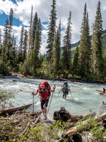 Mike and Ben step out of the river crossing - it was much faster and deeper on return.