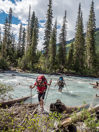Mike and Ben step out of the river crossing - it was much faster and deeper on return.