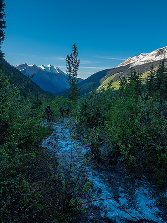 Descending the road.