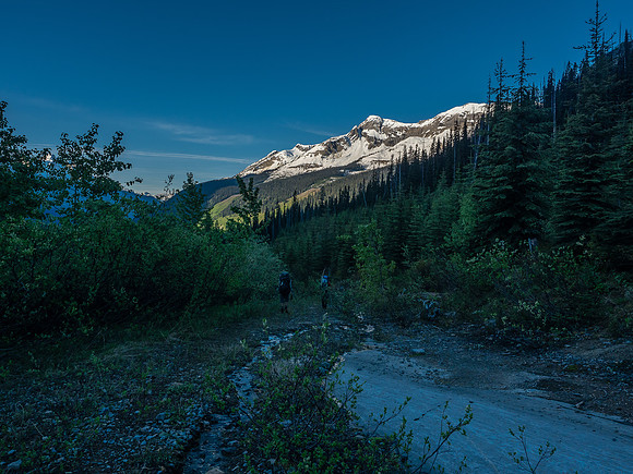 Descending the road.