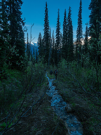 Descending the road.
