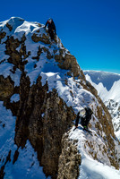 Descending the rock crux on Diadem Peak.