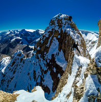 Descending the rock crux on Diadem Peak.