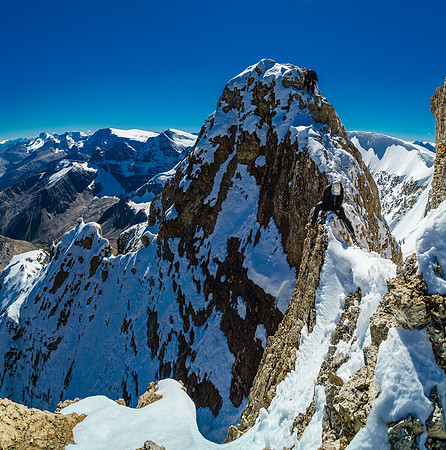 Descending the rock crux on Diadem Peak.