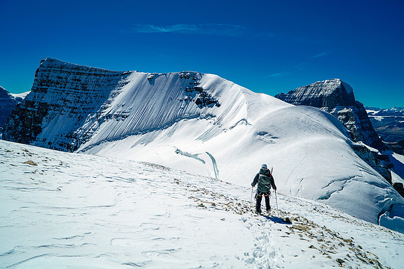 Walking down the easy summit slopes of Diadem to the col.