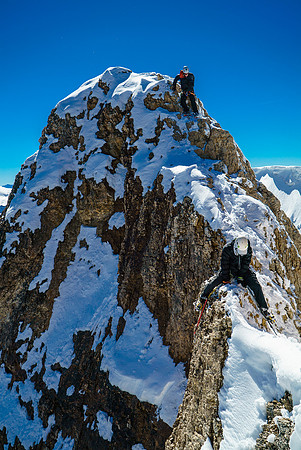 Descending the rock crux on Diadem Peak.