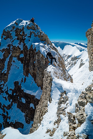 Descending the rock crux on Diadem Peak.