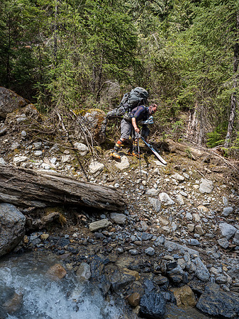 Tricky terrain into a deep gully with a nice cool stream.