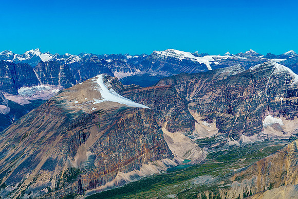 Serenity Peak (L), Fortress Mountain, Catacombs Mountain, Mount Geikke, Mount Robson, Mount Fryatt and Mount Edith Cavell (R). Palmer, Thorington and Smith