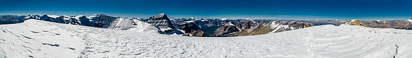 A panorama from what the majority of climbers consider the summit of Diadem Peak. The slightly higher - and much more difficult - rocky summit at right.