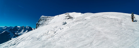 Ben leads up the glacier near the col, to the north ridge of Woolley.