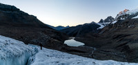Coming up the lower glacier - Woolley Tarn is glass behind us and Engelhard is catching morning alpine glow at upper right.