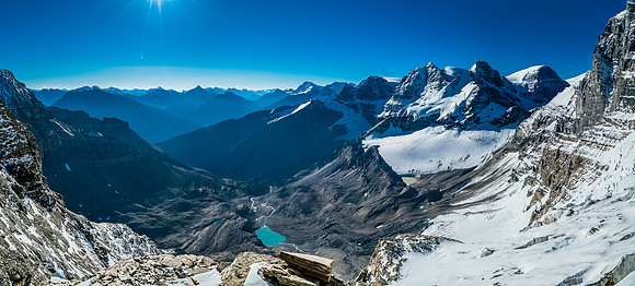 The views back over our bivy and Woolley Tarn are awesome already from the top of the 2nd couloir. Engelhard and Cromwell at far right.