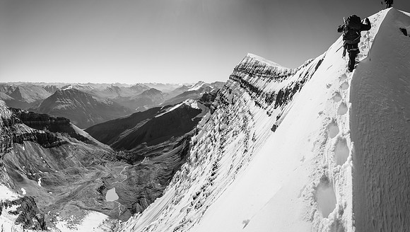 A wee bit of exposure off the snow arete looking down to the Woolley Tarn and our bivy site way below us now.