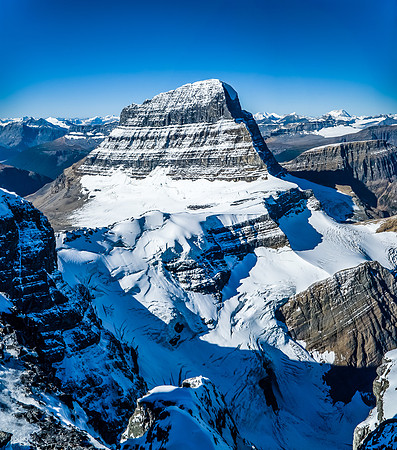 A rare view into the depths beneath Mount Alberta's NE ridge and North Face reveals a very steep glacier, plunging into another "Black Hole"