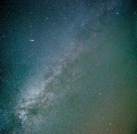 Looking directly overhead at the Milky Way and meteors lighting up the night sky. The M31 (Andromeda) galaxy is even visible here (top left)!
