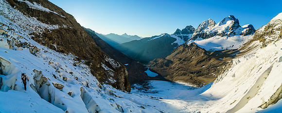 Ben negotiates the heavily crevassed lower glacier leading to the first gully on Diadem Peak.