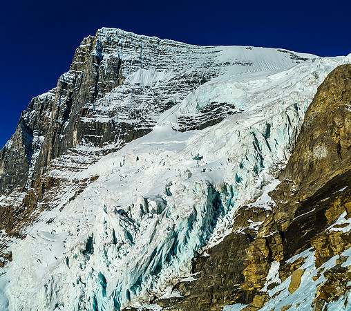 Mount Woolley looms over it's lower glacier.