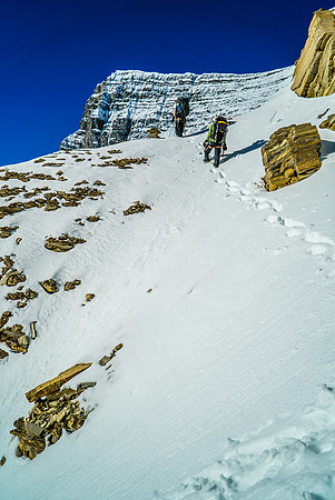 Steven and Ben traverse out of the second couloir - note the cairn.
