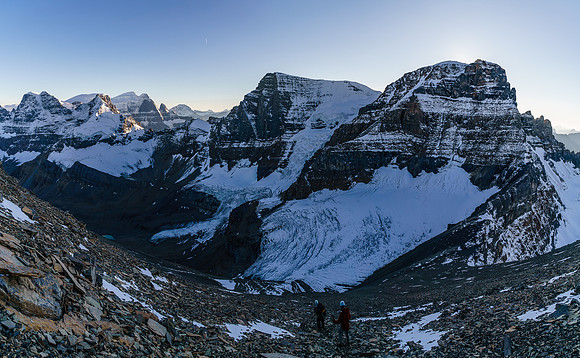 Shadows are lengthening and now we have to get down the cliff bands next to the glacier.