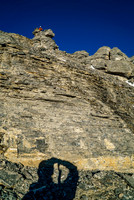 Ben on the summit. Shadows getting long already and we have to descend unknown terrain to our bivy yet.