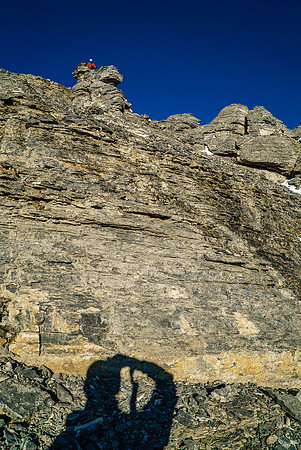 Ben on the summit. Shadows getting long already and we have to descend unknown terrain to our bivy yet.