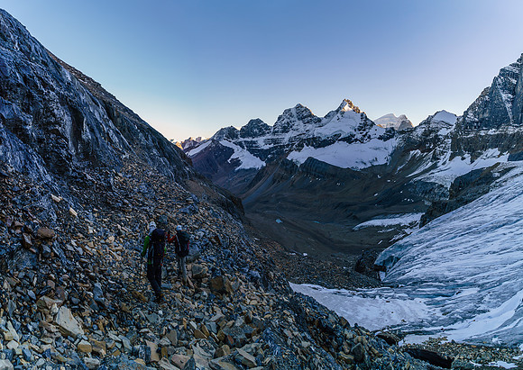 Traversing scree ledges between cliff bands on descent.