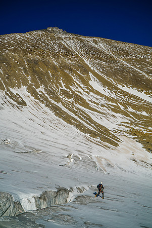 The endless scree slope above the glacier was as much fun as it looks. NONE.