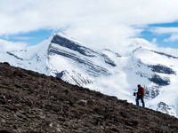 Ben on the summit ridge of Rearguard with the impressive Lynx Mountain in the background.