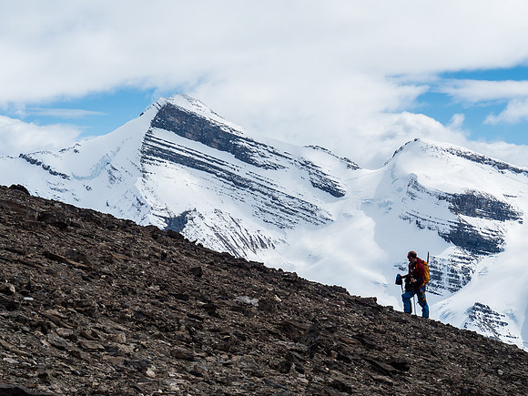 Ben on the summit ridge of Rearguard with the impressive Lynx Mountain in the background.