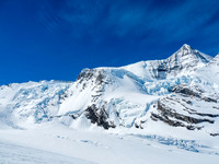 A beautiful world of snow, rock and ice. The Mousetrap at left with The Dome, Kain Face, Robson Cirque and Robson to the right of it.