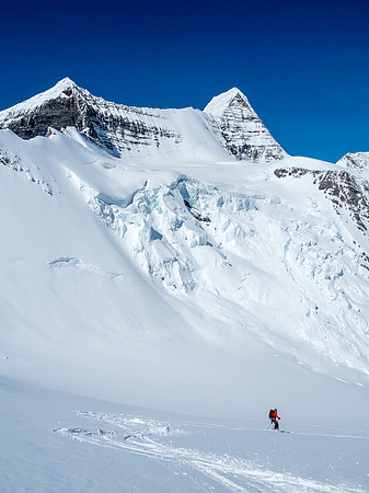 Mike skis down under the Mousetrap and Mount Robson.