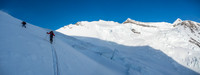 Ben leads up the ramp through the crevasses and seracs opposite the Mousetrap which is clearly visible at right.