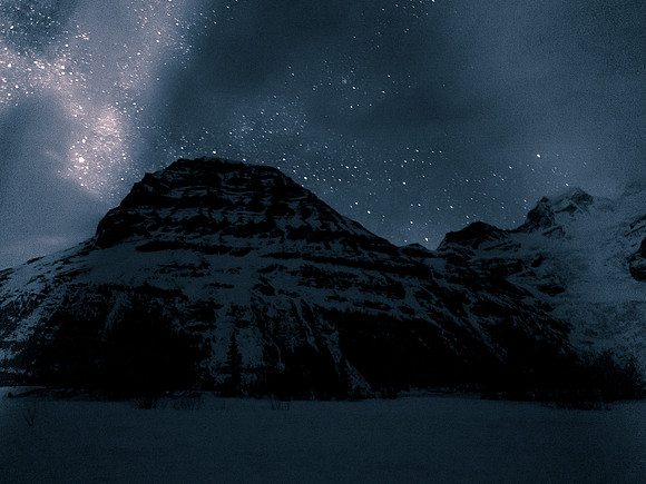 There are clouds over The Helmet (R) but Rearguard's summit is visible at left along with a couple thousand stars.