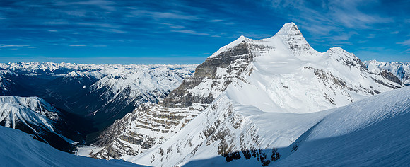 Mount Robson and the Kain Face as we ascend Resplendent. The Helmet to it's right doesn't look like much in comparison but it's also an 11,000er.