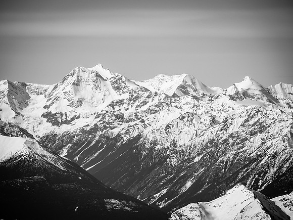 The second highest peak in the Cariboo's and only other 11000er, Mount Sir John Abbott rises at left with John Oliver to the right.