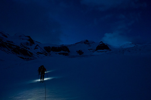 The rope is on as we head up the left side of the Robson Glacier. The Extinguisher Tower visible at right.