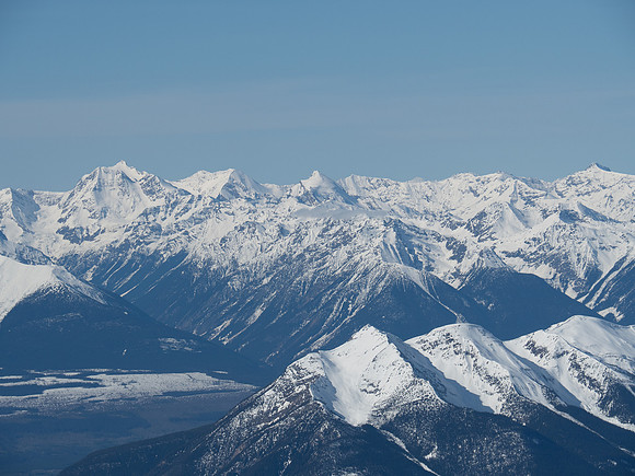 The second highest peak in the Cariboo's and only other 11000er, Mount Sir John Abbott rises at left with John Oliver to the right.
