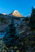 Guardgoat Peak catches sunrise as we work our way down the valley.
