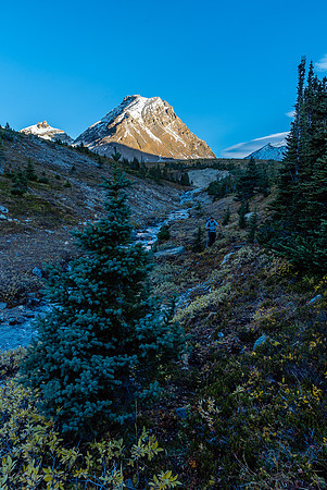 Guardgoat Peak catches sunrise as we work our way down the valley.