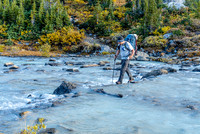 Eric crosses the Brazeau River near Nigel Pass.
