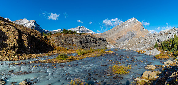 Hiking down the Brazeau River from Cataract Pass. "Nosecone Peak" rising at right.