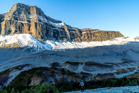 Sunrise on the rockwall looming to the west over Cataract Creek.