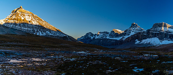 The setting sun on Stewart and its outliers as we continue back to our camp.