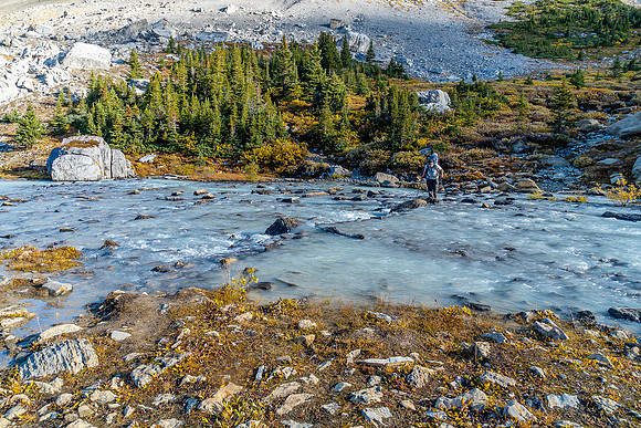 Eric crosses the Brazeau River near Nigel Pass.