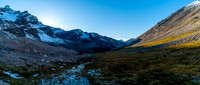 Looking back down Cline Pass with the lower slopes of Willis rising in the sun on the right.