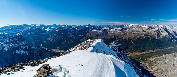 The summit!! This is looking north over the SBT up one of the legs of the Brazeau Loop (L) and towards Poboktan Mountain and Sunwapta Peak in the far distance.