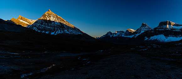 The setting sun on Stewart and its outliers as we continue back to our camp.